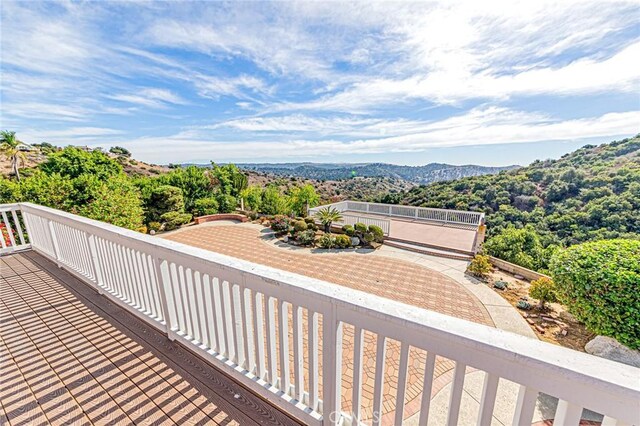 wooden terrace with a mountain view