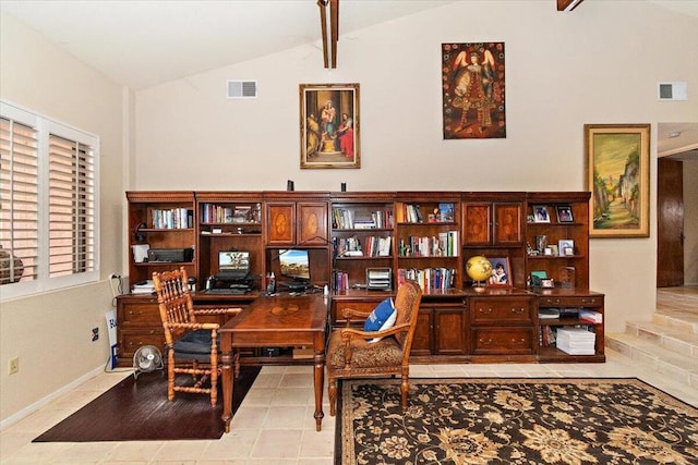 interior space with vaulted ceiling with beams