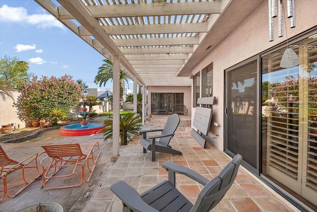 view of patio featuring a pergola