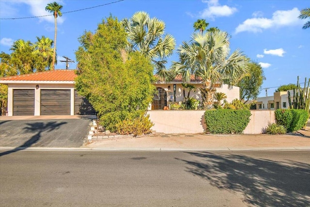 view of front of property with a garage