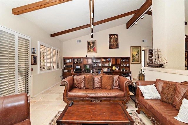 living room featuring light tile patterned floors and lofted ceiling with beams