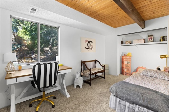 carpeted bedroom featuring beamed ceiling and wooden ceiling