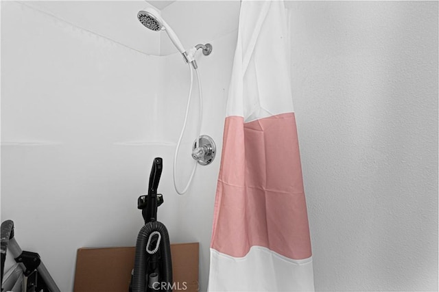 bathroom with curtained shower