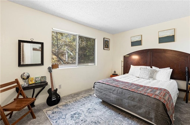 carpeted bedroom with a textured ceiling