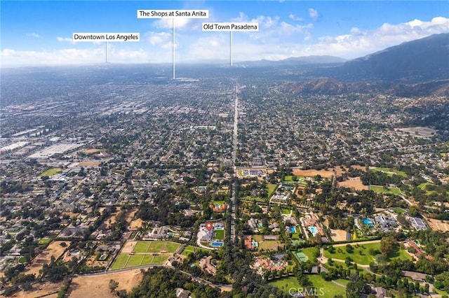 drone / aerial view featuring a mountain view