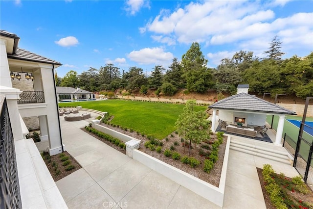 188 Deodar Ln, Bradbury, CA 91008 - view of green lawn featuring a gazebo, a patio area, an outdoor living space, and view of wooded area