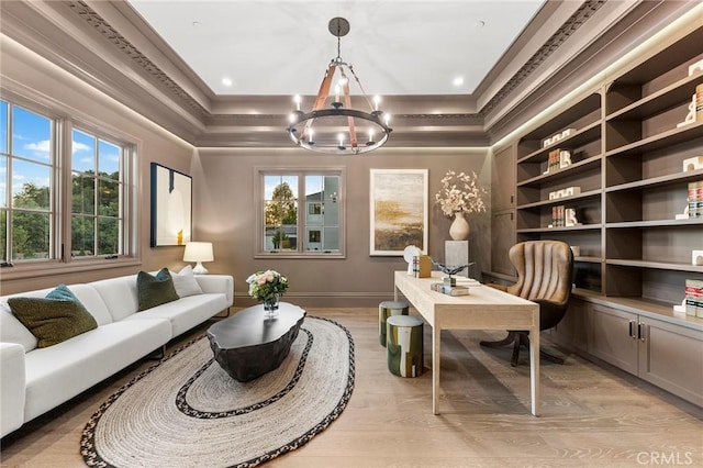 188 Deodar Ln, Bradbury, CA 91008 - office area with plenty of natural light, a chandelier, light wood-type flooring, ornamental molding, and a tray ceiling