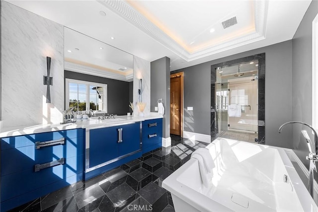 bathroom featuring a raised ceiling, crown molding, vanity, and independent shower and bath