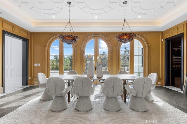 dining room with a tray ceiling and beverage cooler