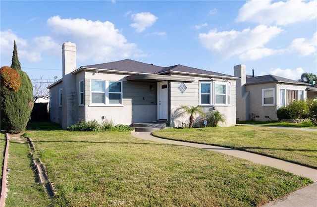 view of front of house with a front yard