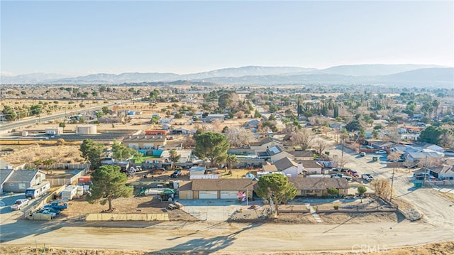 drone / aerial view featuring a mountain view