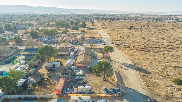 drone / aerial view featuring a mountain view