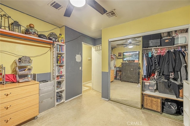 bedroom featuring ceiling fan and a closet