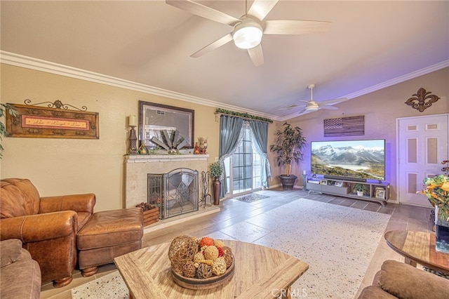 living room with ornamental molding, lofted ceiling, hardwood / wood-style floors, and ceiling fan