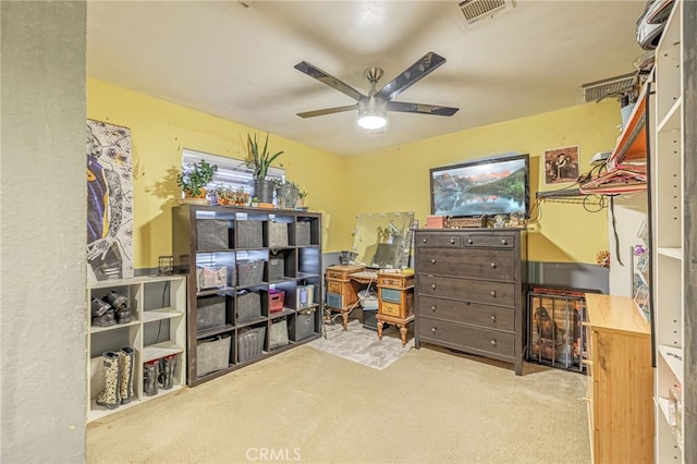 interior space featuring ceiling fan