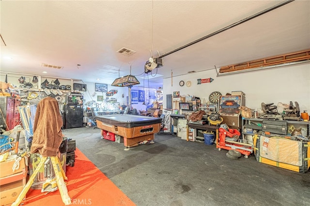 playroom featuring pool table and concrete flooring