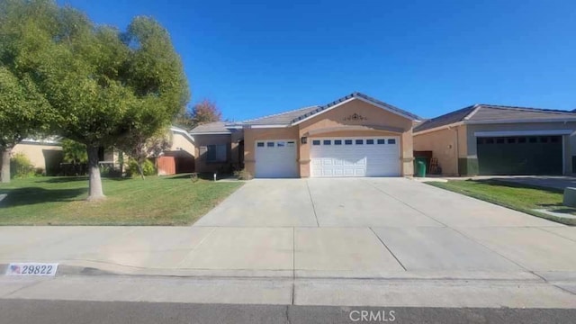 29822 Cool Meadow Dr, Menifee, CA 92584 - ranch-style home with an attached garage, stucco siding, a front lawn, concrete driveway, and a tiled roof