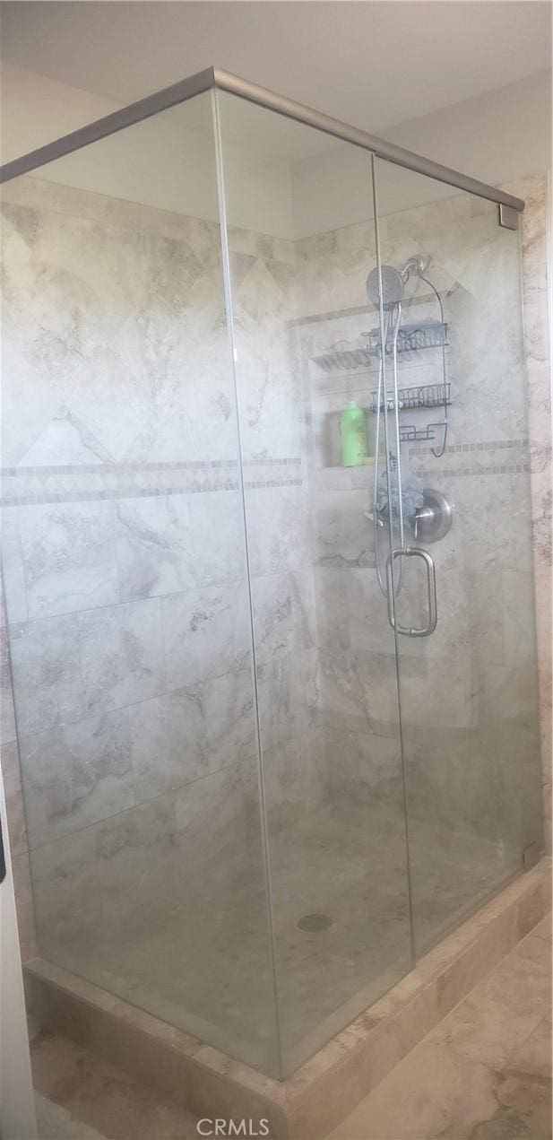 bathroom featuring walk in shower