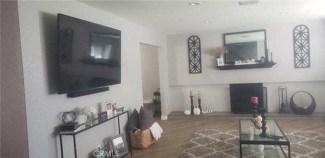 living room with wood-type flooring