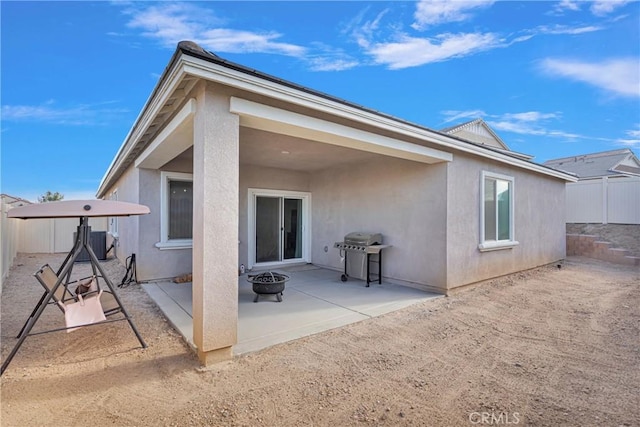 back of house featuring a patio