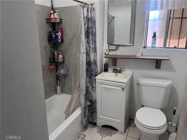 full bathroom featuring tile patterned flooring, vanity, toilet, and shower / tub combo