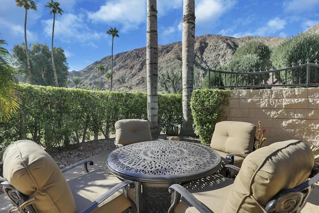 view of patio / terrace with a mountain view