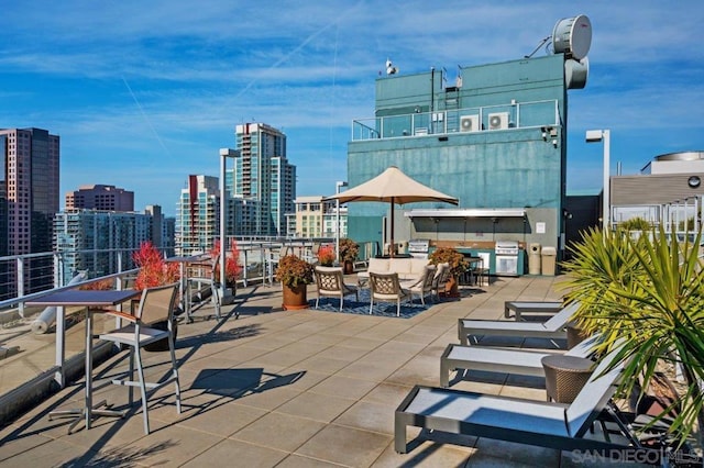 view of patio with a grill