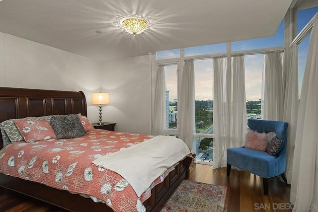 bedroom featuring dark hardwood / wood-style floors