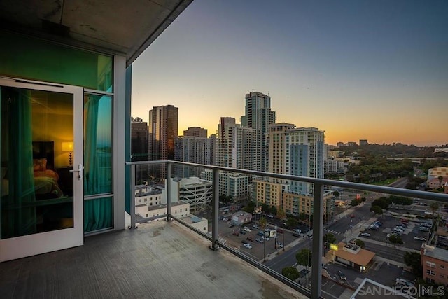 view of balcony at dusk