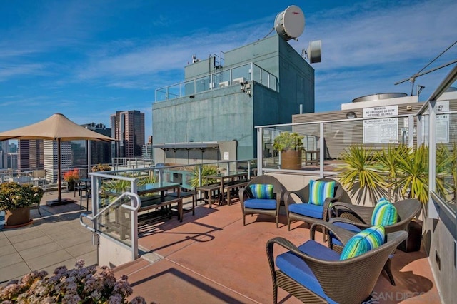 view of patio with a balcony