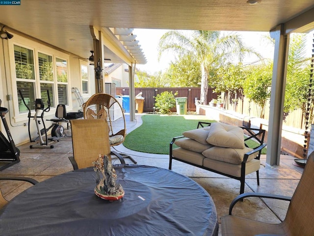 view of patio with ceiling fan