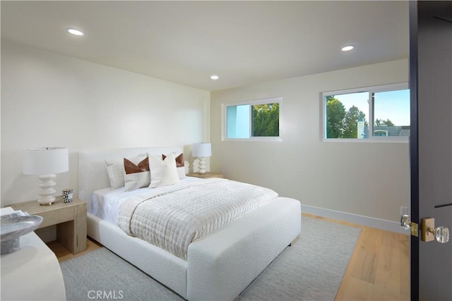 bedroom featuring light hardwood / wood-style floors