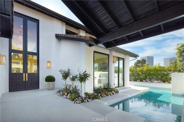 view of pool featuring a patio area