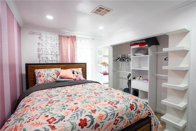 bedroom featuring crown molding