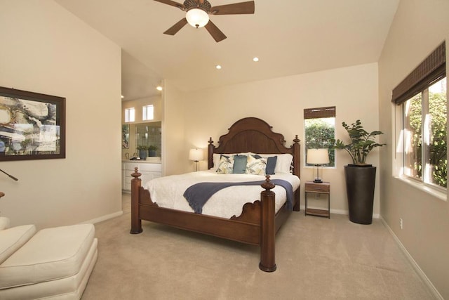 bedroom with ceiling fan and light colored carpet