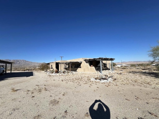 view of front of house with a mountain view