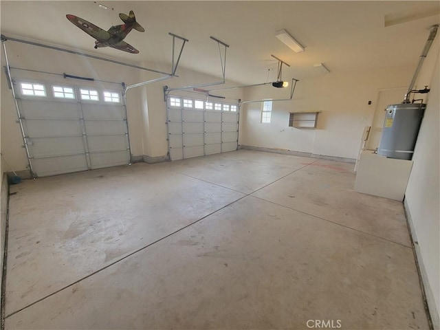 garage with a garage door opener and water heater