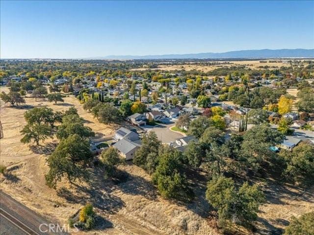 drone / aerial view featuring a mountain view