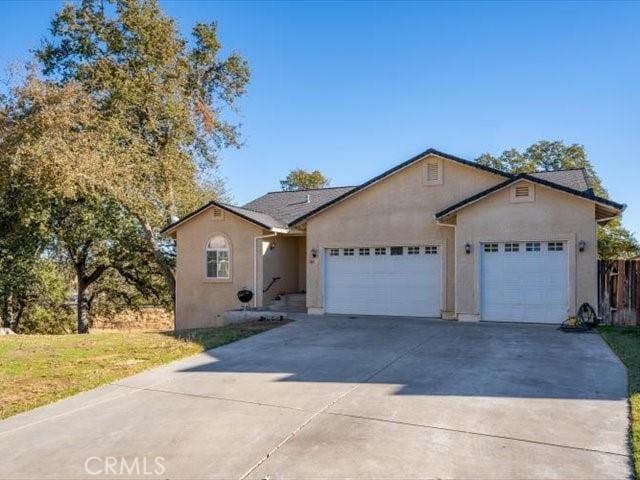 ranch-style home with a garage