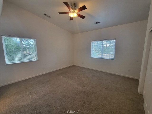 empty room featuring carpet flooring and ceiling fan