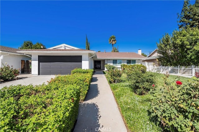 single story home with a garage