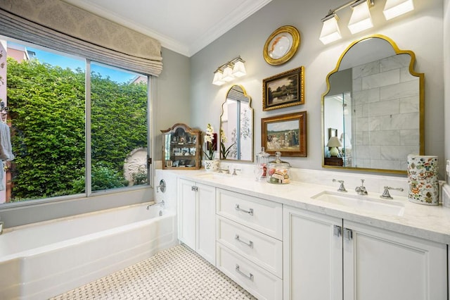 bathroom featuring tile patterned floors, vanity, a bathtub, and ornamental molding