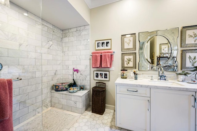 bathroom featuring tile patterned flooring and vanity