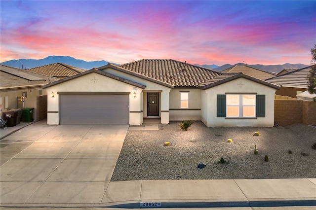 29052 Topeka Cir, Winchester, CA 92596 - view of front facade with a mountain view and a garage