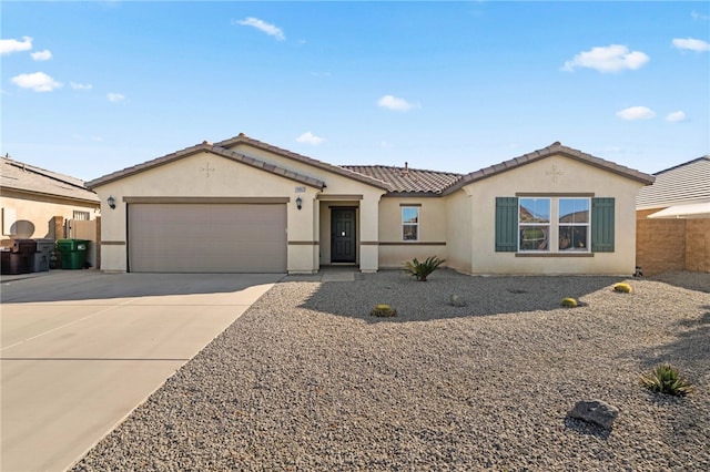 view of front of property with a garage