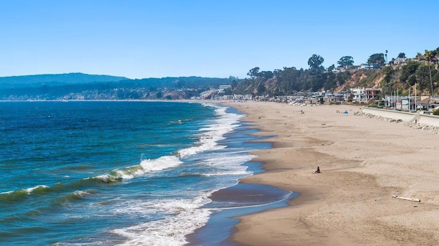 view of water feature with a view of the beach