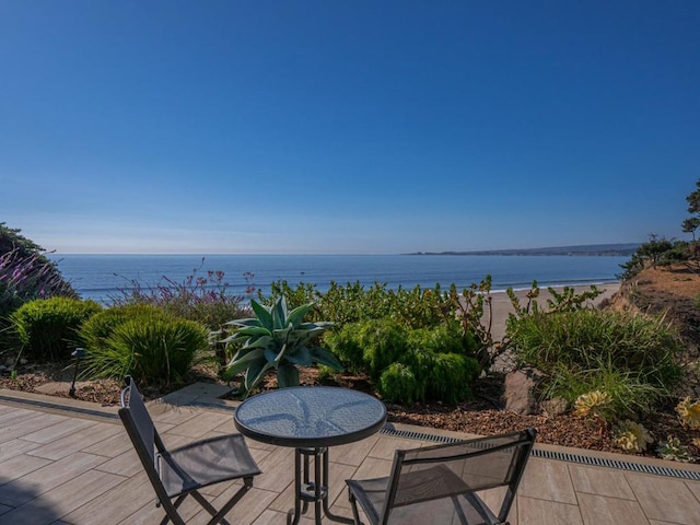 view of patio / terrace featuring a water view