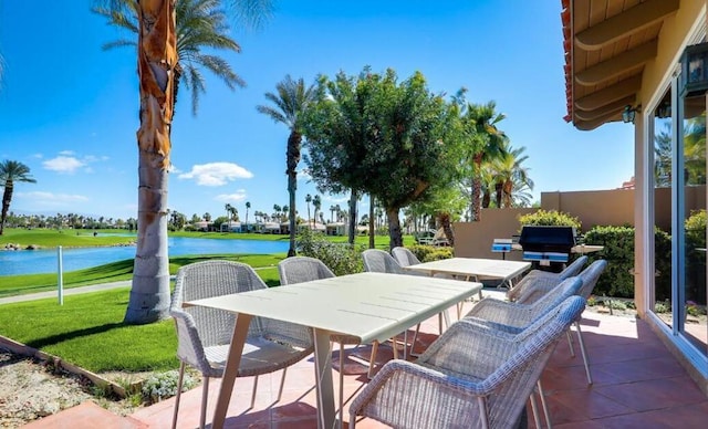 view of patio with a water view