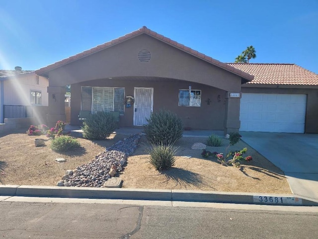 single story home featuring a garage