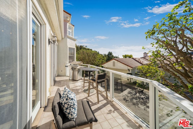 balcony featuring a grill